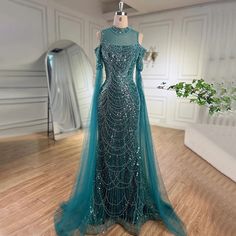 a dress is displayed on a mannequin in a room