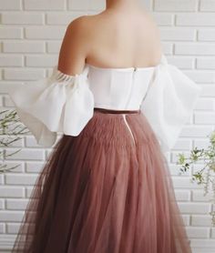 - Details- White and brown colors- Organza and tulle fabrics- A-line gown with puffy sleeves - Brown velvet belt - For special occasions Teuta Matoshi, Organza Gown, Velvet Belt, Organza Gowns, Cooler Style, Women's Outfits By Occasions, Velvet Gown, V Neck Wedding Dress, Brown Velvet