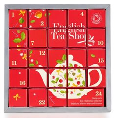 the english tea shop calendar is shown in red and silver, with green leaves on it