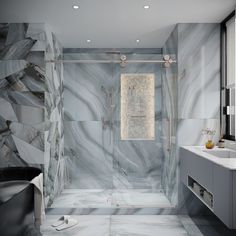 a bathroom with marbled walls and flooring, including a walk - in shower