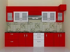 a kitchen with red cabinets and white cupboards on the counter top, in an empty room