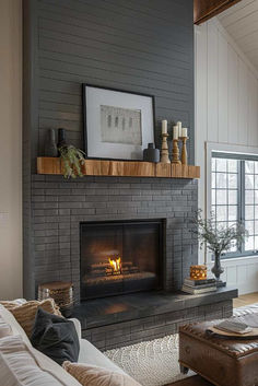 40 Elegant Gray Brick Fireplace Ideas for a Contemporary Home Dark Gray Painted Fireplace Brick, Charcoal Colored Fireplace, Remodeled Brick Fireplace, Dark Gray Brick Fireplace Paint Colors, Fireplace Ideas Contemporary, Fireplace With No Surround, Old Fireplace Remodel, Electric Fireplace Ideas Farmhouse, Accent Wall With Brick Fireplace