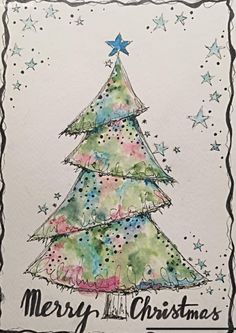 a christmas card with a watercolor painting of a tree and stars on the top