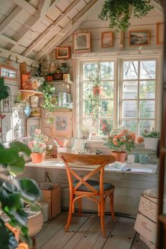 a room filled with lots of potted plants next to a window