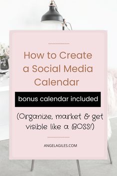 a pink sign with the words how to create a social media calendar in black and white