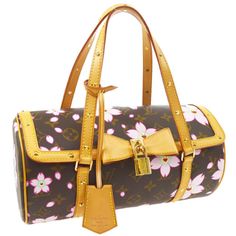 -Circa 2008 -Brown/Pink Leather/Pvc -Cherry Blossom Pattern -Flat Top Handles -Foldover Top With Snap Fastening -Bow Detailing -Padlock Detail -Key Charm Leather 100%, Pvc 100% Louis Vuitton Noe Bb, Louis Vuitton Cosmetic Pouch, Lv Backpack, Louis Vuitton Favorite, Louis Vuitton Pochette Metis, Louis Vuitton Crossbody Bag, Lv Pochette, Louis Vuitton Speedy 25, Louis Vuitton Crossbody