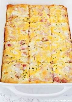 a square casserole dish with ham and cheese