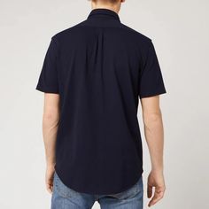 This navy short-sleeved shirt by Polo Ralph Lauren is detailed with a buttoned collar and a central placket with contrasting white buttons. The forever investment is completed with an embroidered polo player logo on the chest. Navy Polo Shirt, Cotton Poplin Shirt, Navy Shorts, Ralph Lauren Polo, Poplin Shirt, Polo Ralph Lauren Mens, Polo Shirts, Cotton Poplin, Short Sleeve Shirt