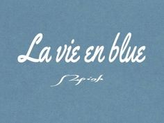 the words la vie en bleu are written in white on a blue background