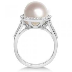 South Sea Cultured Pearl and Diamond Halo Ring 14K W. Gold (11mm) Formal White Pearl Ring With Prong Setting, White Pearl Ring With Prong Setting For Formal Occasions, Formal White Diamond Ring With Pearl Drop, Formal Oval Pearl Ring, Formal White Pearl Ring With Center Stone, White Oval Pearl Ring With Prong Setting, Akoya Pearl Ring With Diamond Accents, Formal Pearl Ring With Diamond Halo Design, Formal Diamond Pearl Ring With Halo Design