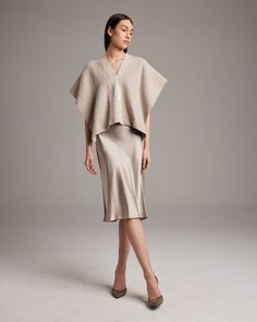 Hand-loomed short manta, or poncho, features the Estrella symbol which represents divine femininity. 100% Pima Cotton Size OS Handmade in Southern Chile by Mapuche Artisans Product Care: Dry Clean or Delicate Hand Wash Elegant Spring Cape Shawl, Elegant Evening Poncho For Fall, Elegant Beige Poncho For Fall, Elegant Beige Cape Poncho, Elegant Beige Poncho, Elegant Batwing Sleeve Poncho For Fall, Tunic Styles, Mid Dresses, Hand Loom