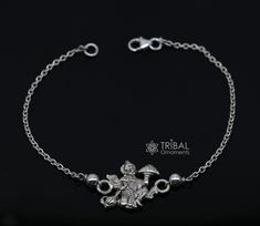 925 sterling silver handmade custom design  'Lord Hanuman' Bracelet Or Rakhi with solid  chain, this is a special design bracelet rakhi for Rakshabandhan Festival in India, best wishes gift for your brother and sister's,  Metal-925 sterling silver. Item type-Rakhi Bracelet. Length-6 to 8 inches.(length will be customized if buyer request) Weight-3.600 grams. Hanuman pendant size-2.1 cm diameter. Stamped-925. Make excellent gifting and collectible pieces(gift for birthday, wedding, anniversary, m Silver Chain Bracelet With Engraving Option, Silver Name Bracelet With Polished Finish As Gift, Silver Name Bracelet With Polished Finish, Traditional Silver Chain Bracelets Gift, Silver Chain Bracelet With Engraving Option As Gift, Silver Hallmarked Name Bracelet, Hallmarked Silver Name Bracelet, Traditional Silver Bracelets Personalized, Traditional Silver Personalized Bracelets