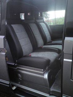 the interior of a vehicle with black leather seats