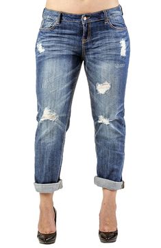 These distressed jeans feature a rolled up hem and a stretchy cotton blend, making them a comfy wardrobe essential for people of all body types. 33" length; 17" leg opening; 11" front rise; 17" back rise 98% cotton, 2% spandex Machine wash, tumble dry Imported Rolled Hem Cotton Jeans For Spring, Mid-rise Jeans With Rolled Hem, Dark Wash Jeans With Rolled Hem And Straight Leg, Cotton Jeans With Rolled Hem For Spring, Spring Cotton Jeans With Rolled Hem, Trendy Relaxed Fit Jeans With Rolled Hem, Relaxed Fit Cotton Jeans With Rolled Hem, Relaxed Fit Denim Jeans With Rolled Hem, Mid-rise Dark Wash Jeans With Rolled Hem