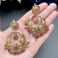 Featuring a bridal choker necklace set made in 22ct gold and embellished with precious rubies, emeralds and pearls Price Breakup Summary Component Rupees % of Total 22k Gold 403,289 76.9% Stones & Beads 33,298 6.3% Making Charges 72,592 13.8% Taxes (GST) 15,275 3.0% Total 524,455 100.0% View Detailed Price Breakup Green Ruby Jewelry With Intricate Design, Traditional Gold-plated Emerald Necklace For Wedding, Gold Chandbali Emerald Necklace For Diwali, Green Ruby Jewelry, Gold Chandbali Emerald Necklace For Wedding, Green Emerald Necklace In 22k Gold For Wedding, Wedding 22k Gold Emerald Necklace, Gold Ruby Chandbalis For Wedding, 22k Gold Emerald Necklace For Wedding In Temple Style