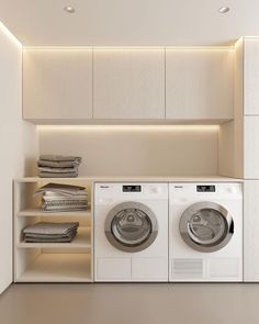 a washer and dryer in a small room