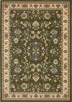 a green rug with floral designs on the bottom and beige trimmings around it