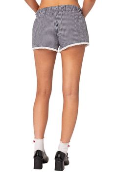 Pleated ruffles trim the hems of these charming cotton shorts covered in smart gingham checks. Elastic waist 100% cotton Machine wash, dry flat Imported Trendy Gingham Cotton Shorts, Gingham Pajama Shorts With Elastic Waistband, Gingham Cotton Summer Shorts, Spring Gingham Bottoms With Built-in Shorts, Gingham Bottoms With Built-in Shorts, Gingham Shorts, Led Fashion, Beauty Sale, Gingham Check