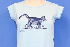 Chest 17 in.  Length 21.5 in.   Tag Says: Crazy Shirts Hawaii, Large, 50/50 Cotton/Polyester  This shirt  Comments: Tag says large but fits like a modern women's small           24-04-127196 Casual Fitted T-shirt With Cat Design, Fitted Casual T-shirt With Cat Design, Cat Sneakers, Kliban Cat, Crazy Shirts, Sublimation Ideas Projects Inspiration, Cartoon Crazy, Sublimation Ideas, Fat Cat