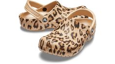 Original. Versatile. Comfortable.The iconic clog that started a comfort revolution around the world, now with fun new graphics, including elegant and tropical florals and leopard print! Crocs Classic Clogs offer lightweight Iconic Crocs Comfort™, a print for every personality, and an ongoing invitation to be comfortable in your own shoes.  Classic Printed Clog Details:    Incredibly light and fun to wear  Ventilation ports add breathability and help shed water and debris  Easy to clean and quick Summer Slip-resistant Clogs, Tropical Florals, Crocs Classic Clogs, Shoes Classic, Strap Heels, Black Floral, Clogs, Baby Shoes, Leopard Print