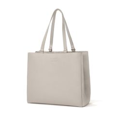 Meet the elevated upgrade to our signature tote. Inspired by late nights at the office and impromptu weekend adventures, the neutral Allyn Tote in bone will elevate your style as fast as you can grab your phone from the exterior slip pocket. While the magnetic tab closure gives you more space when you need it, the interior snap fastener provides additional security and an alternative way to carry. A neoprene laptop sleeve and bottle holder ensure your things are always protected, while thoughtfu Leather Laptop Tote, Leather Work Bag, Dagne Dover, Weekend Adventures, Laptop Tote, Work Tote, Leather Laptop, Snap Fasteners, Work Bag