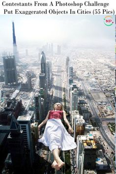 a woman laying down on top of a tall building in the middle of a city