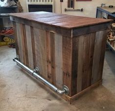 a large wooden box sitting on top of a hard wood floor