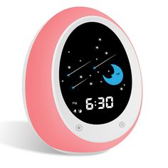 an alarm clock with the moon and stars on it's face is shown in pink