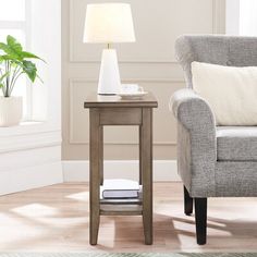 a living room scene with focus on the chair and side table