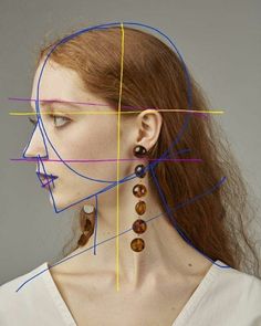 a woman's face with multiple colored lines in the shape of her head and neck