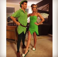 a man and woman dressed up as peter panton and tinkerbell for halloween