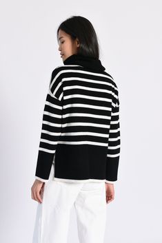 Wrap yourself in luxurious warmth with this oversized striped turtleneck sweater, crafted from 100% premium cashmere. Designed for comfort and timeless style, this cozy yet elegant sweater is perfect for layering or wearing on its own. Key Features: Material: Made from ultra-soft 100% cashmere for a lightweight, breathable, and cozy feel. Design: A relaxed oversized fit with bold stripes and a chic turtleneck for effortless winter style. Versatile: Ideal for casual outings, workwear, or cozy eve Striped Turtleneck Sweater For Layering, Striped Cashmere Sweater For Winter, Striped Cashmere Winter Sweater, Winter Striped Cashmere Sweater, Striped Turtleneck Sweater, Sophisticated Office, Elegant Sweater, Striped Turtleneck, Ribbed Turtleneck