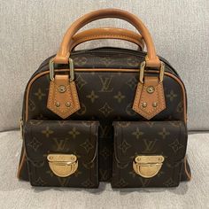 Authentic Louis Vuitton Monogram Manhattan Pm. Preowned. From 2005. Size: 11.5x8x5.75 Inches. Made In France. Code: Th0025. Comes With Tag And Dustbag. Handbag Is Used, Zipper Works But Seems A Bit Dry. Please Reference Photos. All Items From My Personal Collection. From A Smoke Free Pet Free Home. Same Day/Next Day Shipping. No Trades. Thanks For Looking. Tags:Preowned Lv, Preowned Vuitton, Preowned Louis Vuitton, Preowned Manhattan Pm, Preowned Manhattan, Lv Sale, Vuitton Sale, Preowned Monogram, Lv, Vuitton Louis Vuitton Manhattan Bag, Louis Vuitton Brown, Louis Vuitton Coin Purse Buyma, Louis Vuitton Brown Bag, Pre Owned Louis Vuitton, Authentic Louis Vuitton, Manhattan, Womens Tote Bags, Louis Vuitton Monogram