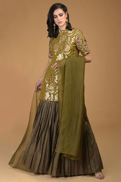 Featuring an olive green kurta in silk base with banarasi zari, zardosi, beads and crystal embroidery. It is paired with matching gharara pants and a dupatta.  FIT: Fitted at bust and waist. COMPOSITION: Silk. CARE: Dry clean only. Zardozi Gharara, Grey Lengha, Gharara Pants, Designer Dress For Men, Kurta Pants, Banarasi Brocade, Crystal Embroidery, Stitching Dresses