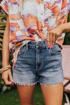 - These high waist shorts are giving summer vibes! - Unlined denim material with subtle fading and distressed detail - A waistline with belt loops, a hidden zip fly, and button closure - A flattering silhouette that ends in unfished frayed hemlines Mid-rise Medium Wash Shorts With Belt Loops, Summer High-waisted Jean Shorts With Belt Loops, Summer Cutoff Jean Shorts In Medium Wash, Mid-rise Medium Wash Jean Shorts With Belt Loops, Medium Wash High-waisted Jean Shorts With Belt Loops, Medium Wash High-waisted Jean Shorts, Spring High-waisted Dark Wash Jean Shorts, Summer Washed Denim Blue Jean Shorts, Summer Jean Shorts In Medium Wash