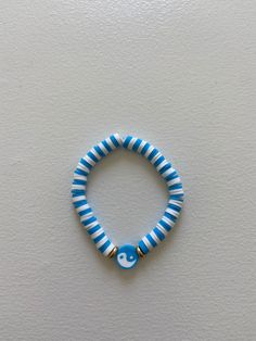 Blue ying yang bracelet  Very bright and vibrant Trendy Light Blue Friendship Bracelets, Trendy Blue Friendship Bracelets, Trendy Light Blue Friendship Bracelet, Trendy Blue Beaded Bangle Bracelet, Blue Bangle Bracelets For Friendship, Trendy Blue Bangle Friendship Bracelets, Trendy Blue Jewelry For Friendship, Trendy Blue Bangle Bracelets, Blue Round Beads Wristband For Friendship