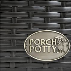 a metal sign that says ponch potty on the side of a basket wall