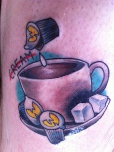 a drawing of a cup and saucer with ice cubes on the side of his leg