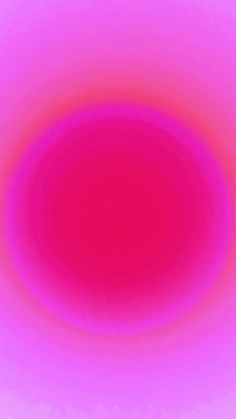 a red and pink circular object is shown in the middle of an image with no background