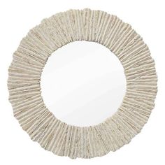 a round mirror made out of straws on a white background with the reflection in it