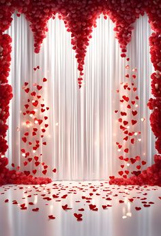 red hearts are floating in the air over a white backdrop with sheer drapes and lights