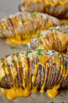 baked potatoes with cheese and parsley on top