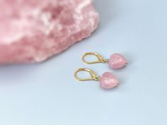 "Handmade Pink Heart Rose Quartz Dangle earrings for women. Perfect gift for mom or wife with January birthday. Facetted genuine rose quartz drops are set in your choice of sterling silver, 14k gold fill, rose gold or solid 14k gold and hang from matching leverbacks.  Pink Rose Quartz gemstone drops are dainty 12 mm (approx 1/2\") with an overall earring length of about 1 1/4\". Sweet and simple, lightweight feminine earrings.  I lovingly handcraft all jewelry and hair accessories one at a time Pink Heart Gemstone Earrings, Pink Heart-shaped Gemstone Earrings, Pink Teardrop Jewelry For Valentine's Day, Hypoallergenic Rose Quartz Jewelry Gift, Pink Rose Quartz Earrings Gift, Pink Rose Quartz Earrings For Gifts, Rose Quartz Dangle Jewelry Gift, Pink Gemstone Earrings For Valentine's Day, Pink Heart Earrings For Mother's Day Gift