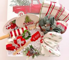 an assortment of holiday items in a gift box