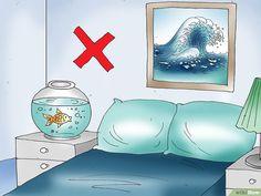 a bed room with a fish bowl and a painting on the wall