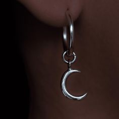 About this item Moon Earrings handcrafted with love, each pair features a delicate crescent moon pendant adorned with a lustrous finish that captures the essence of moonlight. Made of sterling silver 925 Measurements: Ring size: 14mm Crescents size: 10mm ● Want to see more jewelry from my shop?  https://www.etsy.com/shop/MURJewelryStore ● The item will be beautifully wrapped, as shown in the last picture of the listing, and ready for gifting! Our packaging includes an eco-friendly gift box and a reusable protective case that shields the jewelry from friction and scratches. Each piece is handcrafted in Bali from high-quality silver. It will be shipped via DHL from Bali Island with a tracking number that you can easily track on the postal service's website. ● If you have any questions, do no Minimalist Moon Charm Drop Earrings, Minimalist Moon Shaped Single Earring, Minimalist Moon Earrings For Everyday, Minimalist Moon-shaped Everyday Earrings, Crescent Sterling Silver Cartilage Earrings As Gift, Minimalist Sterling Silver Hoop Earrings With Moon Charm, Handmade Sterling Silver Huggie Earrings, Sterling Silver Crescent Earrings With Ear Wire, Sterling Silver Cartilage Earrings With Moon Charm For Gift