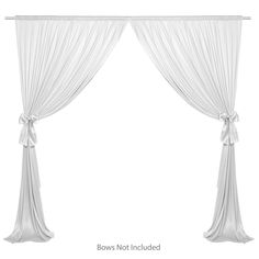 two white drapes with bows on them