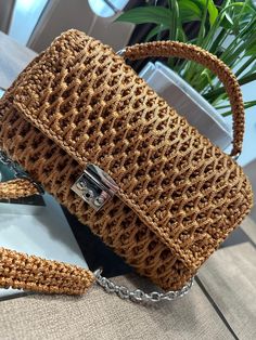 Thank you for your interest in my crochet purse. This top handle bag will be a stylish and practical addition to any outfit! Elevate your fashion game with this cross body bag. This small shoulder bag is perfect for going to party or a casual outing. 100% handmade Aproximate size: 26-16-7cm/ 10-6-3inch Elegant Crochet Bag With Detachable Strap For Travel, Elegant Crochet Travel Bag With Detachable Strap, Luxury Crochet Top Handle Bag For Everyday, Luxury Crochet Top Handle Bag For Daily Use, Trendy Woven Crochet Top Handle Bag, Trendy Natural Crochet Top Handle Bag, Chic Handheld Crochet Bag With Top Carry Handle, Crochet Crossbody Bag With Braided Handles For Shopping, Luxury Woven Crochet Bag For Daily Use