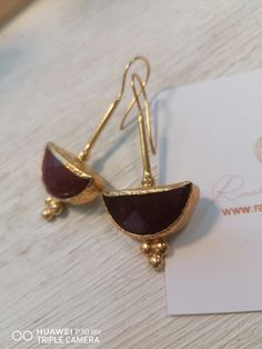 Etruscan style earrings gold, on bronze and finished with faceted natural red Jaspers, light elegant suitable for any occasion. Total length 5cm, width 2.5cm. They are shipped with box and guarantee. Bohemian Gold Faceted Earrings, Elegant Brown Brass Earrings, Gold Faceted Ruby Earrings, Red Gemstone Gold-plated Earrings, Red Gemstone Gold Plated Earrings, Brass Earrings With Natural Stones, Brass Earrings With Natural Stones For Gift, Natural Stone Brass Earrings For Gift, Red Brass Drop Earrings