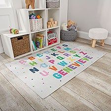 a child's playroom with bookshelves, toys and stuffed animals on the floor